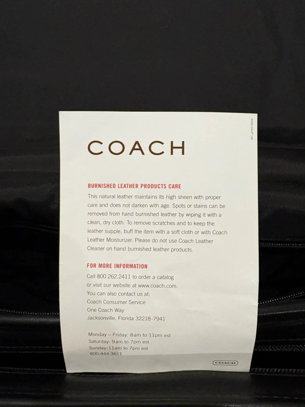 Coach sleek black